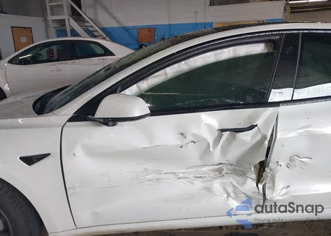 2021 Tesla Model 3 Standard Range Plus Rear-Wheel Drive from USA, damaged, VIN 5YJ3E1EA6MF009508